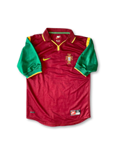 Close-up of embroidered crest on 1998-99 Portugal retro football jersey